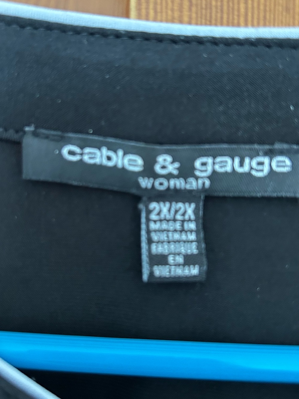 Cable & Gauge Black Sleeveless Blouse with White Logo Trim - Picture 3 of 7
